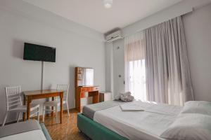 Postel nebo postele na pokoji v ubytování Hotel Panorama