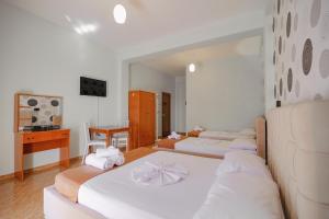 Postel nebo postele na pokoji v ubytování Hotel Panorama