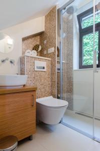 Kúpeľňa v ubytovaní Apartments & Rooms Tiramola - Old Town + 34 fotografií
