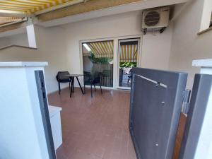 an open door to a room with a table and chairs at Guest House Nina in Novigrad Istria +24 photos
