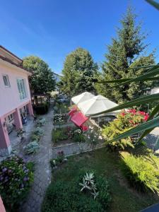an overhead view of a garden with flowers and plants at Casa Constantin si Elena ( Adults only ) in Eforie Nord