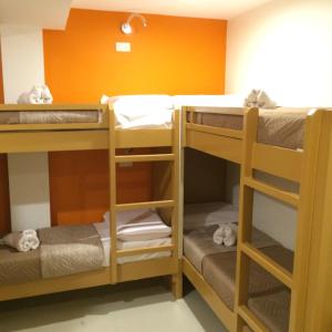 Postel nebo postele na pokoji v ubytování Stone House Hotel Pasay
