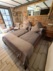 Posezení v ubytování Hotel b&b altes hinterhäusel