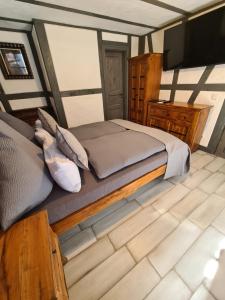 Postel nebo postele na pokoji v ubytování Hotel b&b altes hinterhäusel