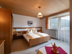 Llit o llits en una habitació de Ferienwohnungen Haus Schwaiger