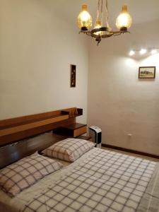 Ένα ή περισσότερα κρεβάτια σε δωμάτιο στο Casa Lauro +5 φωτογραφίες