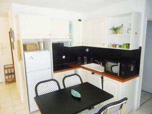 Gallery image of Bel appartement 3 pièces climatisé 400m des plages in Cavalaire-sur-Mer +3 photos