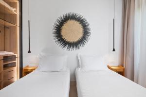 Postel nebo postele na pokoji v ubytování Sun n Salt Private Villas