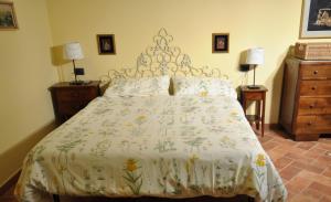 Postel nebo postele na pokoji v ubytování B&B Le Balze
