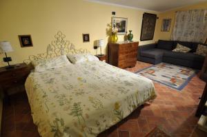 Postel nebo postele na pokoji v ubytování B&B Le Balze