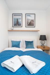 Кровать или кровати в номере Apartamenty Porto