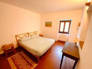 A bed or beds in a room at Agriturismo Giandriale