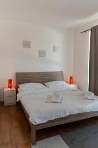 Cama o camas de una habitación en Los Lorentes Residences Bulle