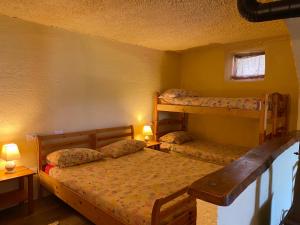 A bed or beds in a room at Agriturismo Giandriale