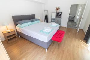 Tempat tidur dalam kamar di Apartments Vanaris