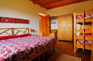A bed or beds in a room at Agriturismo Giandriale