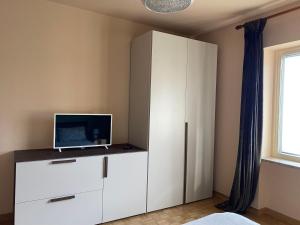 TV a/nebo společenská místnost v ubytování Civicocentouno