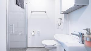 Koupelna v ubytování Anstatthotel Goldau - self-check-in + 19 fotografií
