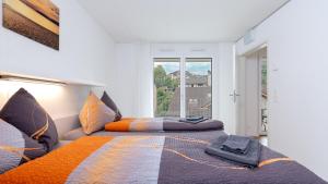 Letto o letti in una camera di Anstatthotel Goldau - self-check-in