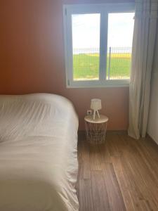 Cama ou camas em um quarto em Villa Alba