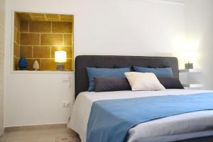 Postel nebo postele na pokoji v ubytování B&Beach Ospitalità Siciliana