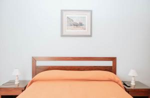 Postel nebo postele na pokoji v ubytování B&B La Formichella