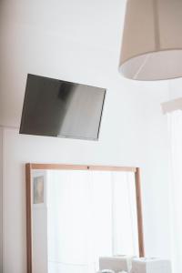 TV a/nebo společenská místnost v ubytování B&B La Formichella
