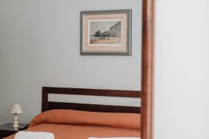 Postel nebo postele na pokoji v ubytování B&B La Formichella