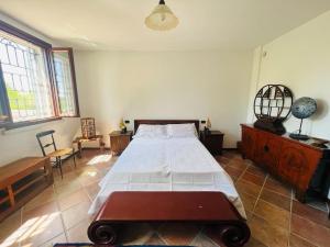 En eller flere senger på et rom på Villa Rita - Rooms&Art