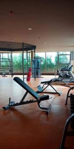 a gym with a bunch of treadles in a room at The Radiance Manila Bay in Manila