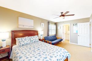 Ένα ή περισσότερα κρεβάτια σε δωμάτιο στο Bayshore 603A +43 φωτογραφίες