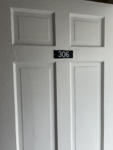 a door with the number on the front at The Admiral Hotel/Motel in Ocean City