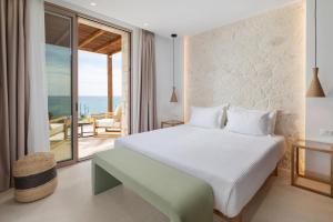 Postel nebo postele na pokoji v ubytování Sun n Salt Private Villas
