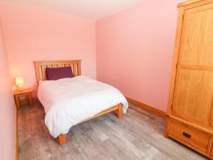 Voodi või voodid majutusasutuse Lack Cottage toas