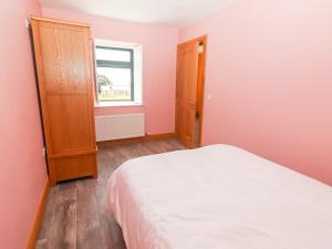 Voodi või voodid majutusasutuse Lack Cottage toas