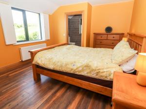 Voodi või voodid majutusasutuse Lack Cottage toas