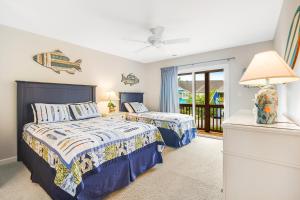 Ένα ή περισσότερα κρεβάτια σε δωμάτιο στο Sea Colony - 55090 Lakewood +60 φωτογραφίες