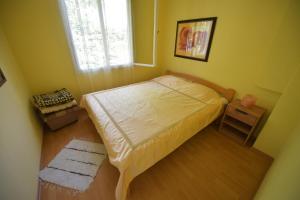 A bed or beds in a room at Danube River house