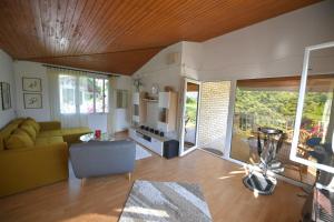 a living room with a couch and a table at Danube River house in Novi Sad