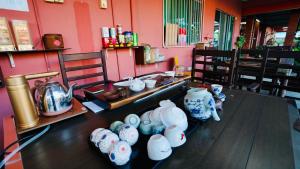 Restoran ili drugo mesto za obedovanje u objektu HUAQIAO HOME 侨之家免费供早餐free breakfast served