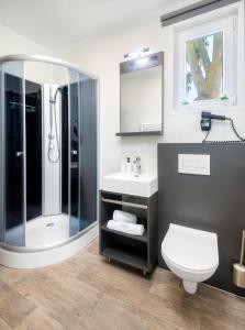 Kúpeľňa v ubytovaní Tisza-tó Apartmanpark
