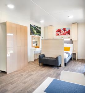 Posteľ alebo postele v izbe v ubytovaní Tisza-tó Apartmanpark
