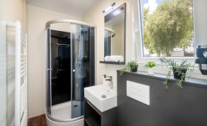 Kúpeľňa v ubytovaní Tisza-tó Apartmanpark