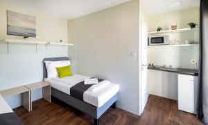 Kuchyňa alebo kuchynka v ubytovaní Tisza-tó Apartmanpark