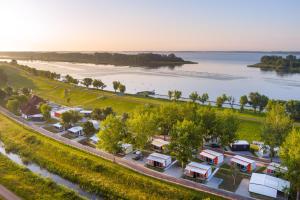 an aerial view of a campgrounds next to a river at Tisza-tó Apartmanpark in Kisköre