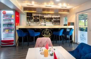 Nápoje v ubytovaní Tisza-tó Apartmanpark
