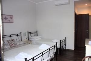 A bed or beds in a room at Villa Rosada
