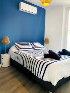 Katil atau katil-katil dalam bilik di Magnifique appartement t2
