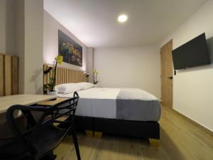 Postel nebo postele na pokoji v ubytování Vita Hotel Boutique