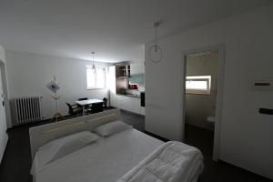 Ένα ή περισσότερα κρεβάτια σε δωμάτιο στο Le case di Emma